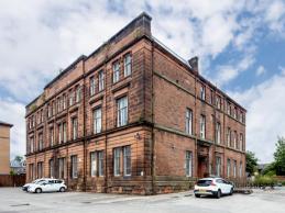 Red sandstone building at 39 Napiershall Street 